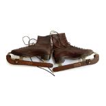 A pair of vintage ice skates, Lilley & Skinner 'The Ice Boot' with Queens Ice Club blade guard
