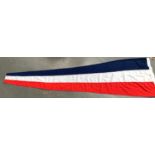 A red white and blue Formation signal flag, 70x250cm