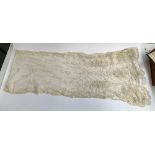 A very fine Victorian lace shawl embellished with baskets of roses, approx. 260cm long, 45cm wide