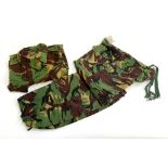 A pair of tropical combat trousers, Nato size 85/88/104; together with a matching tropical combat
