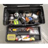 A Zag tackle box, containing a number of sea fishing floats and weights, together with an Abu