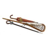 A vintage lacrosse stick, shooting stick, and umbrella (3)