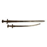 An Indian Talwar sword with double edged 84cm blade; together with one other with broken blade (2)