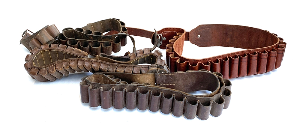 Four leather cartridge belts