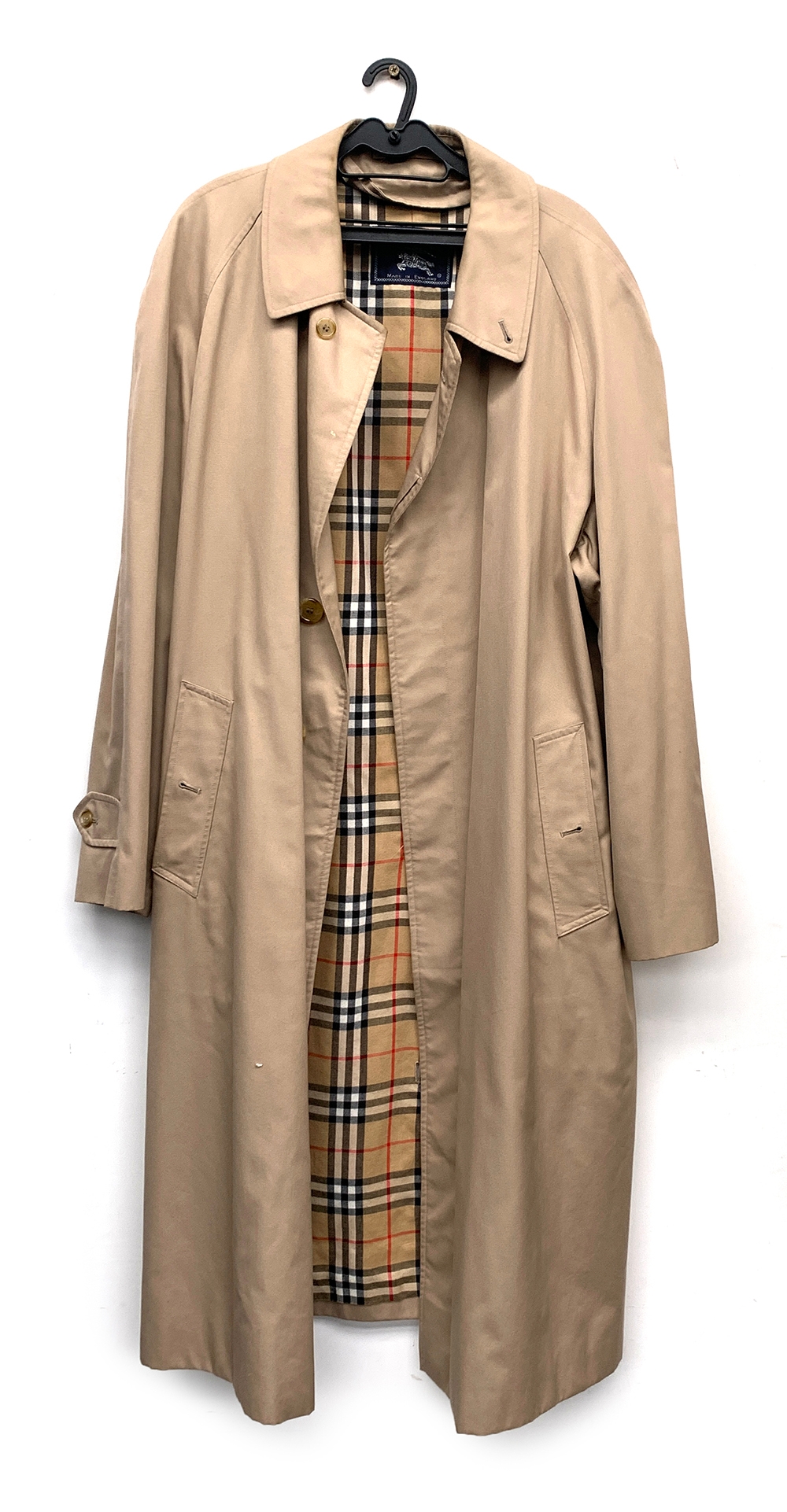 A Burberry's single breasted raincoat with nova check lining, 45" chest 50" chest (inside label 50L)