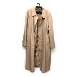 A Burberry's single breasted raincoat with nova check lining, 45" chest 50" chest (inside label 50L)