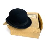 A Gieves of London black bowler hat with original box, size 7 1/4, 20.5x16.5cm