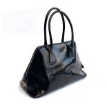 A black leather Prada ladies handbag, in a Prada dust bag, 35cmW