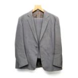 A gent's single breasted wool suit with two pairs of trousers, tailored by Sullivan, Woolley &