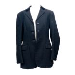 A single breasted tweed jacket, with velvet collar, suitable for show jumping or hunting, size 38;