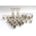 A large collection of glasses depicting fox hunting motifs, heightened in gilt