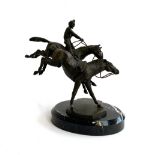 A bronze figure group modelled by J. Osborne, The National Horseracing Museum 'Becher's Brook' The