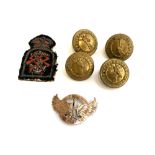 Four brass buttons featuring a giraffe and the inscription ?Tanganyika Territory? by Firmin London