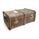 A vintage canvas and bamboo travel trunk, with side handles, the sides monogrammed H.M, 77x54x33cm