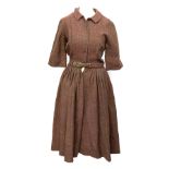 A vintage tweed dress by Cos Cob, size 10, with belt; together with a two piece tailored black