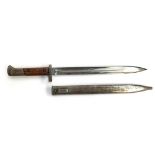 A German bayonet, the hilt marked E3 48, the scabbard E3 46, blade length 30cm