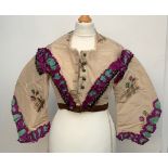 A Victorian silk jacket, with lace and purple trim