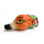 A Royal Staffordshire fox mask stirrup cup, with grape decoration 12.5cm