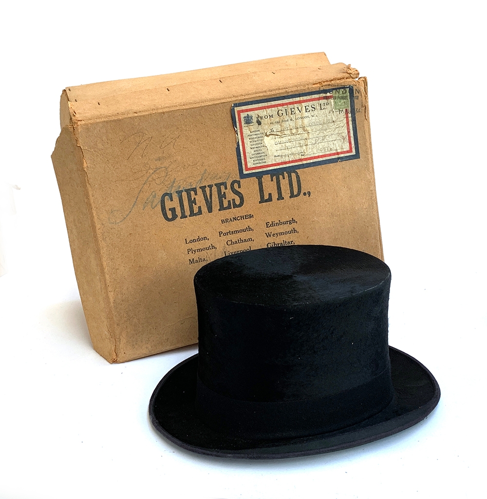 A Gieves of London black silk top hat, size 7 1/8, 20.5x16.3cm