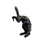 A small Aspinal bronze study of a hare, marked, 11cm high, in Aspinal box