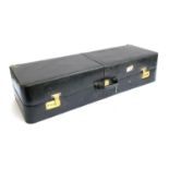 A black leather shoe travel case, with brass fittings, the interior with eight compartments, with