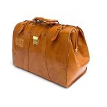 A tan leather briefcase