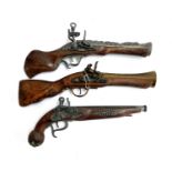Three replica flintlock pistols