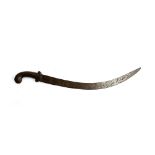 An Indo-Persian Shamshir scimitar, worked pistol hilt, the blade worked with various animals