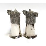 A pair of plated fox mask stirrup cups, silver gilt interior, each 12.5cm high