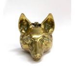 A 19th century brass fox mask door stop, 16cm high