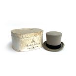 A Lock & Co. grey top hat, size 7 1/4, 20.5x16cm; together with a Herbert Johnson top hat box