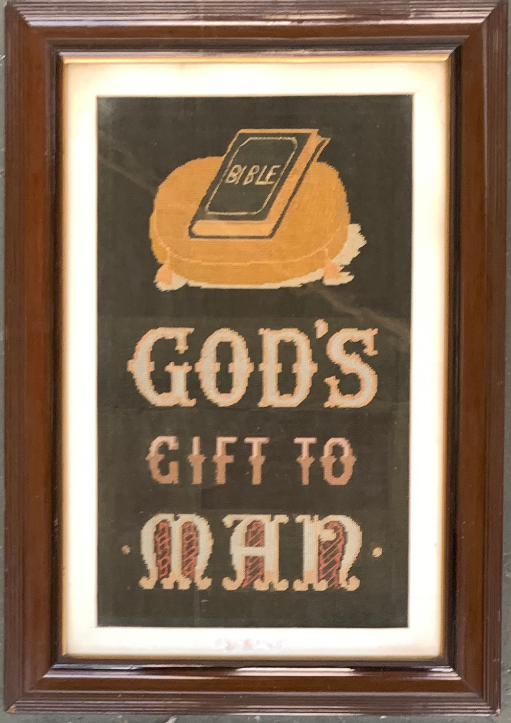 An early 20th century embroidery 'God's Gift to Man', 44x26cm