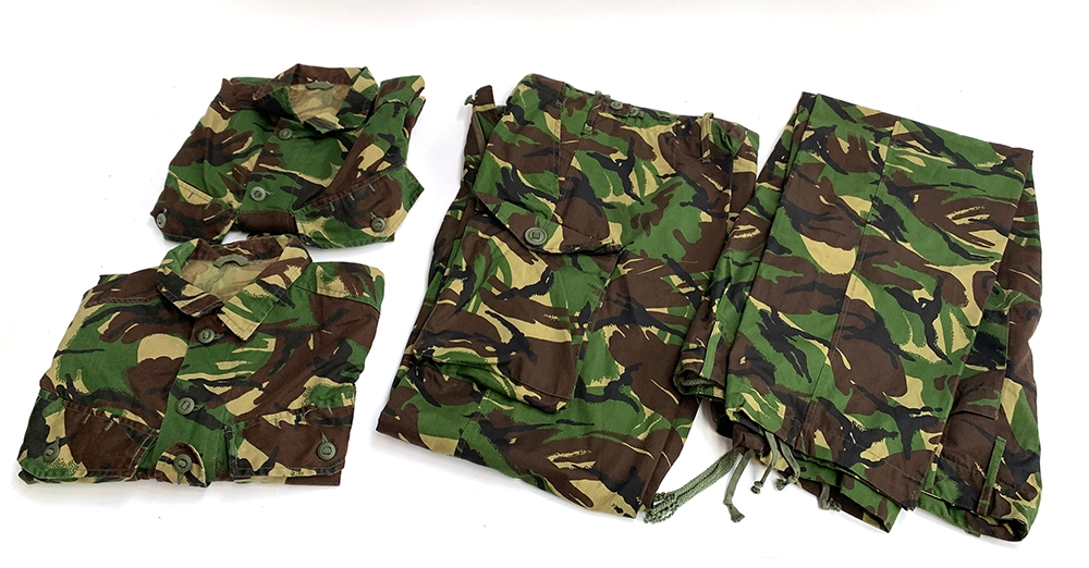 A pair of DPM combat trousers, lightweight, size 85/92/108; together with a pair of DPM combat