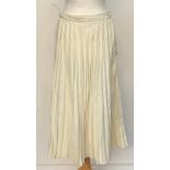 A vintage Lilywhites tennis skirt, together with an underskirt, hooped skirt, etc, in a large