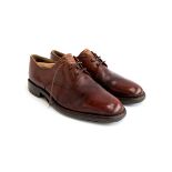 A pair of gents brown leather lace ups, size 11, some wear, with shoe trees