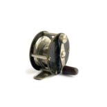 A small nickel fishing reel, 2 1/4 inch drum