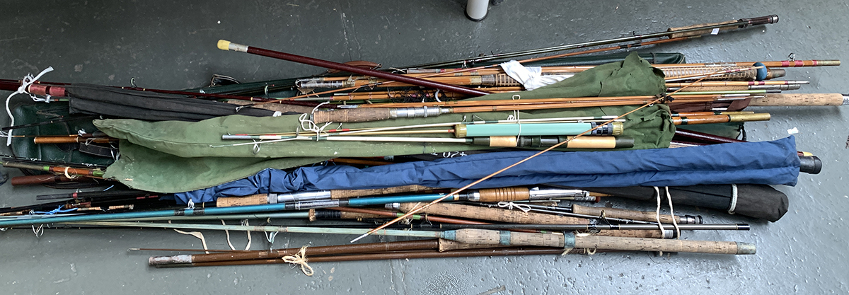 A large quantity of fly, course, and sea rods, various ages, including a folding landing net