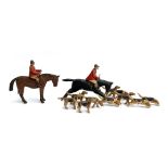 A carved and painted wood fox hunting group attributed to Frank Whittington, of Forest Toys,