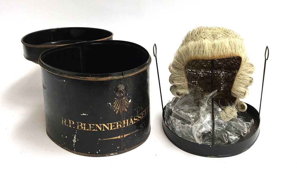 A 19th century barristers wig in black enamelled wig box, made by Ravenscroft Wig & Robe maker,