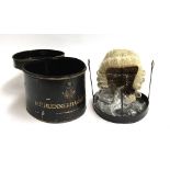 A 19th century barristers wig in black enamelled wig box, made by Ravenscroft Wig & Robe maker,
