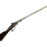 An antique pin fire shotgun, length of barrel 75.5cm *does not require licence