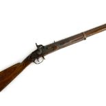 An antique percussion rifle, the side plate marked 'made in', the barrel stamped 389/85, length of