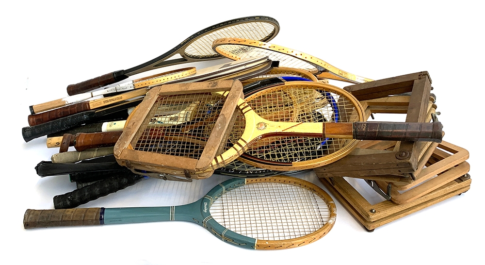 A quantity of vintage tennis and squash rackets, including Dunlop, together with some vintage