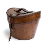 A brown leather top hat box, with vacant plaque to handle