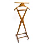 A beechwood gents suit stand, made in Italy, on casters, 108cmH