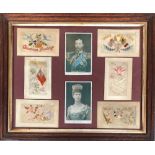 A set of 6 WW1 interest postcards including King George V and Queen Mary, in display frame