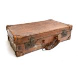 A vintage leather suitcase, marked Carlisle, 67x40x19cm; together with one other, vintage canvas and