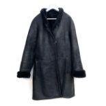 A Mani black sheepskin coat, size 40