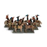 A collection of nine early 20th century model figures, of a Japanese cavalry regiment