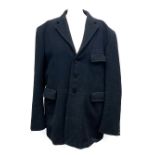A black melton cloth hunting coat with three buttons, tattersall check wool lining, internal